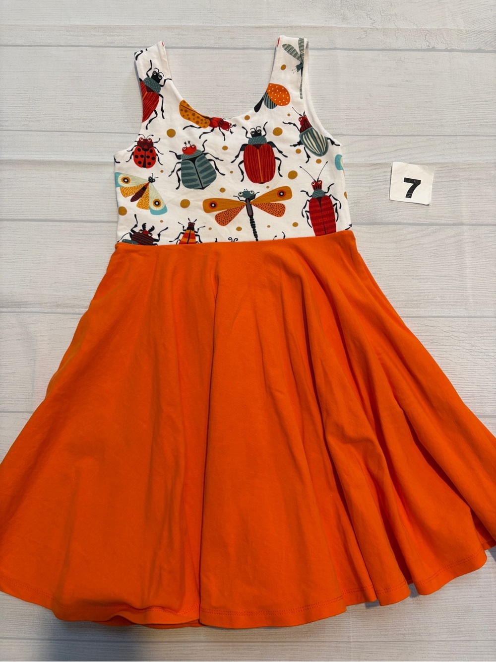 Girls' Orange Twirl Dress with Bug & Floral Print Bodice